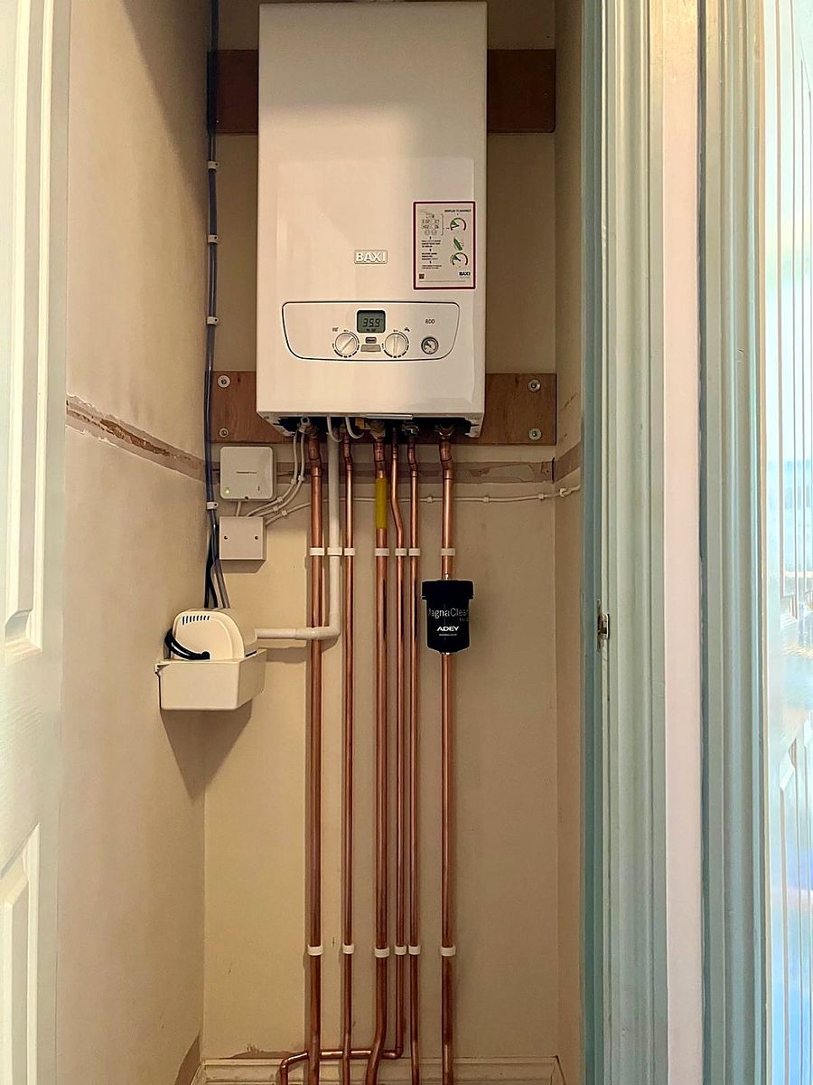 New Baxi boiler with a system filter and neat copper pipework